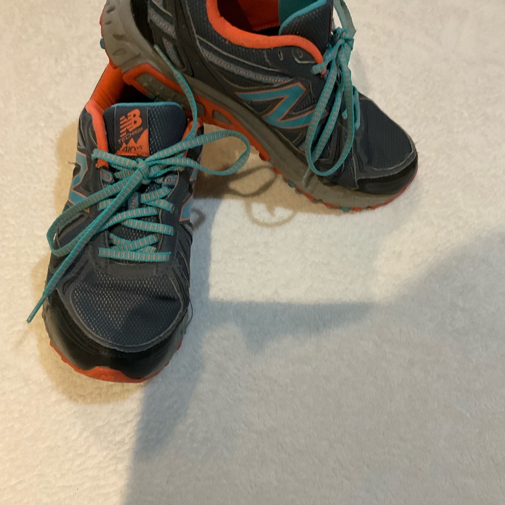 New Balance 410 Woman’s size 7.5 gray, blue, pink  Trail, hiking shoes